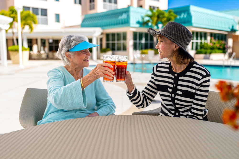 Residents at an outdoor social gathering at The Glenview