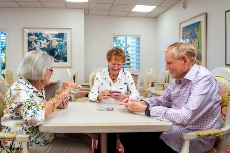 Residents playing cards at The Glenview