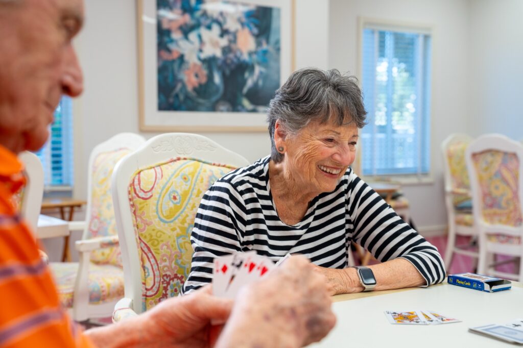 Residents playing cards at The Glenview