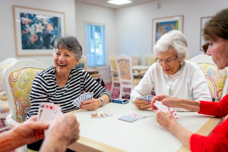 Residents playing cards at The Glenview