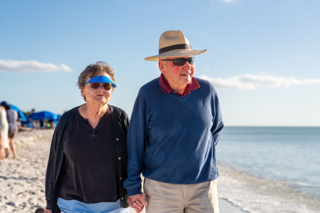 Resident couple on Pelican Bay beach