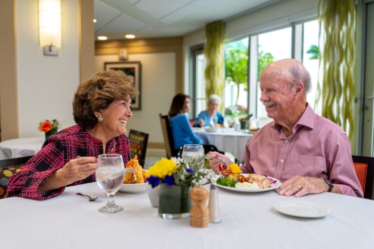 Residents socializing at a dining event