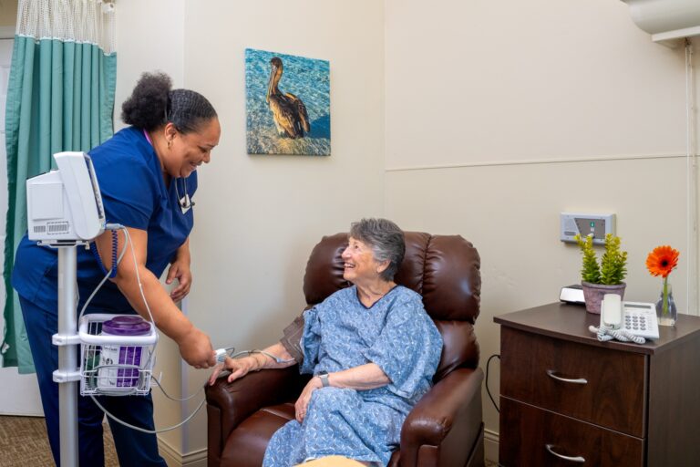 Nurse helping resident at Premier Place