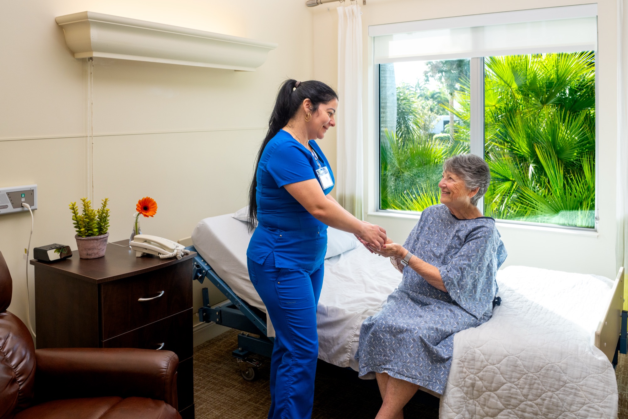 Nurse helping resident at Premier Place