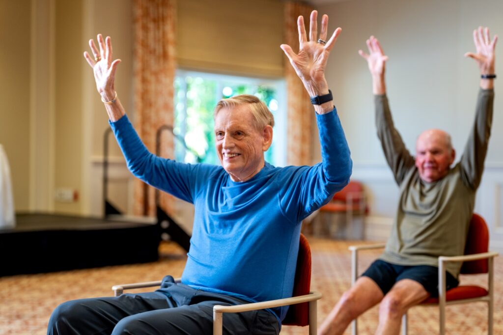 Residents in a group exercise class at The Glenview