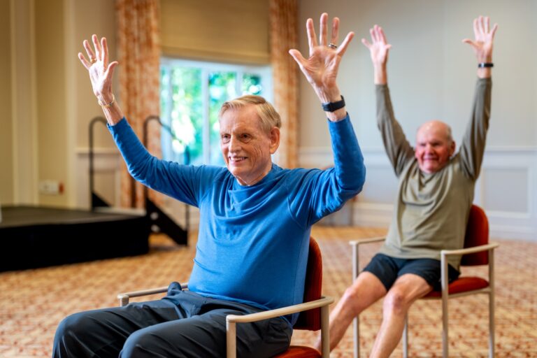 Residents enjoying fitness activities at The Glenview pool