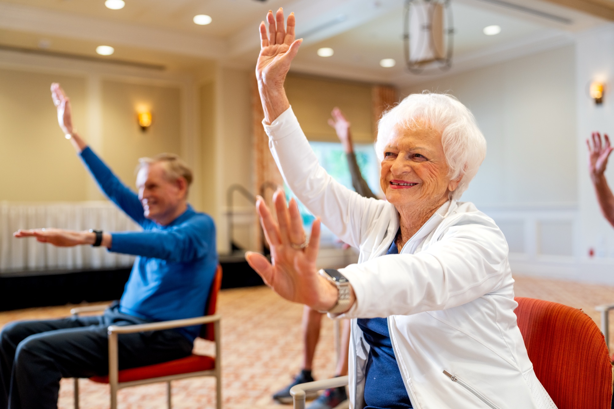Residents in a wellness exercise class at The Glenview