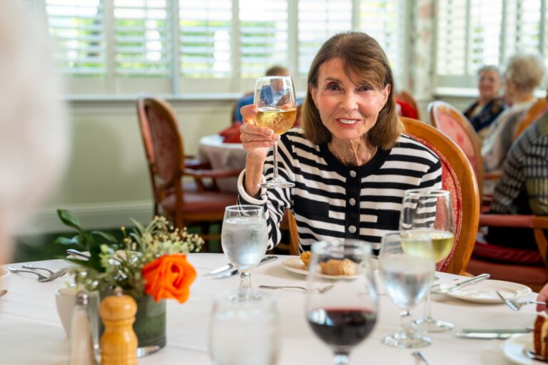 Resident Enjoying a Glass of Wine at The Glenview